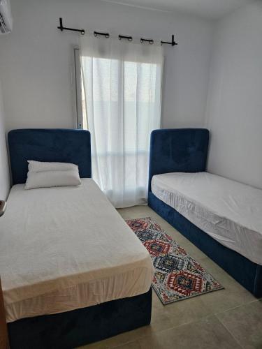 Ένα ή περισσότερα κρεβάτια σε δωμάτιο στο Mountain View Apartments