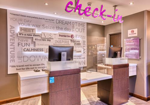 a check in counter in a store at Premier Inn Dublin City Temple Bar in Dublin