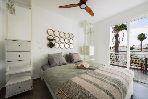 Postel nebo postele na pokoji v ubytování "Sun up" by Corralejobeach Apartments