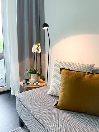 Ένα ή περισσότερα κρεβάτια σε δωμάτιο στο Blueberry Living - Design-Apartments am Starnberger See, Natur & Erholung, Privatparkplatz, nur 400 m zum See
