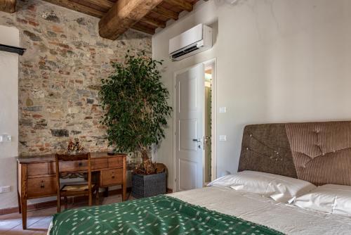 Cama o camas de una habitación en Fattoria Mantellassi