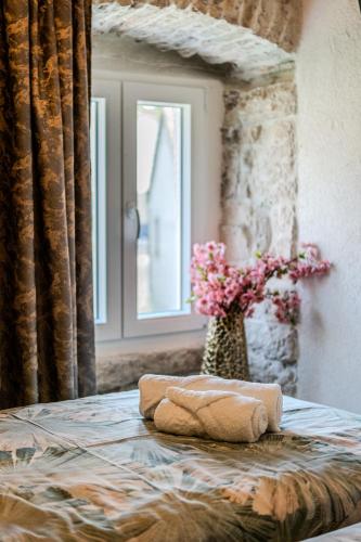 Letto o letti in una camera di Luxury Villa Unikat with Seaview & Jacuzzi