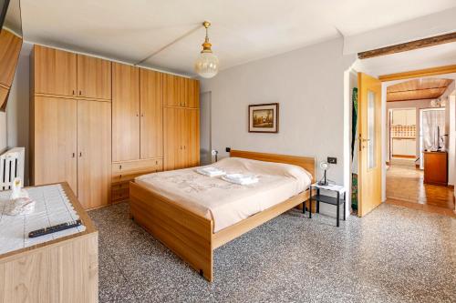 Una cama o camas en una habitación de La terrazza del nonno