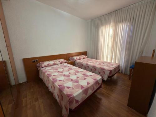 Postel nebo postele na pokoji v ubytování Apartamento pleno centro Benidorm