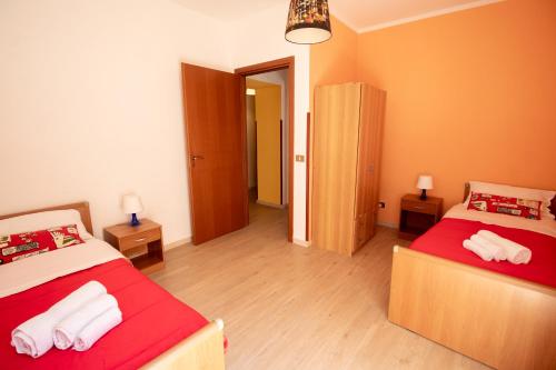 Кровать или кровати в номере Caleidoscopica Bahlara Ballarò