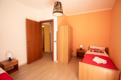 Кровать или кровати в номере Caleidoscopica Bahlara Ballarò