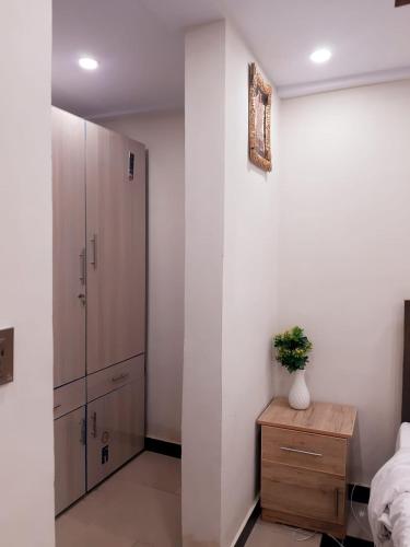 Ένα ή περισσότερα κρεβάτια σε δωμάτιο στο Dunleigh Apartments Murree
