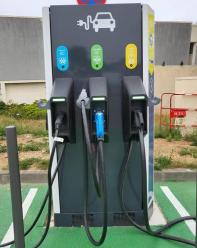 a gas station with a bunch of chargers at "O'Dbark" - duplex 2 étoiles - à 100m de la plage avec jardin in Courseulles-sur-Mer
