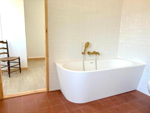 Ένα μπάνιο στο L'appartement Vicente