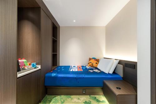 Ένα ή περισσότερα κρεβάτια σε δωμάτιο στο Wyndham Garden Shanghai Pudong