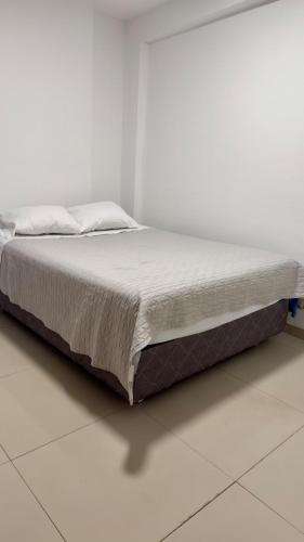Postel nebo postele na pokoji v ubytování Departamento completo en el primer piso