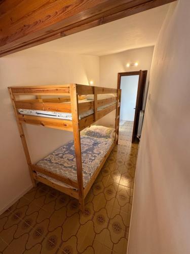 Ένα ή περισσότερα κρεβάτια σε δωμάτιο στο Casa Altolaterra