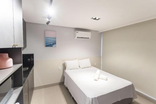 Postel nebo postele na pokoji v ubytování Way Tambaú - Studios Deluxe em João Pessoa por Carpediem