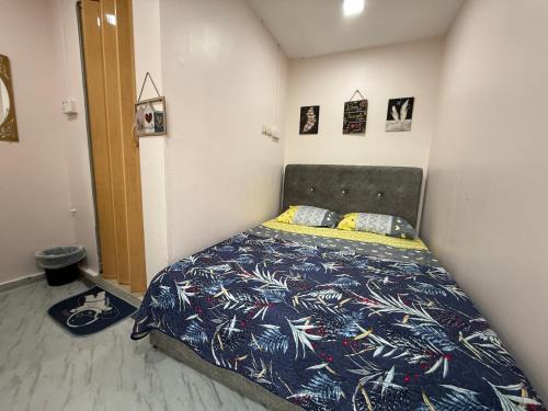 Cama o camas de una habitación en AQ Rawang Inn