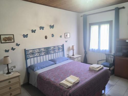 Ένα ή περισσότερα κρεβάτια σε δωμάτιο στο Villa Very II