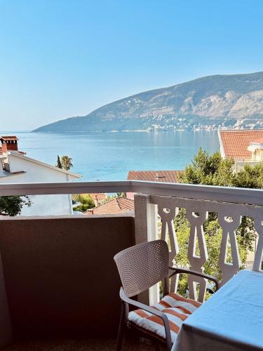 a balcony with a view of the water at Villa Nena in Herceg-Novi