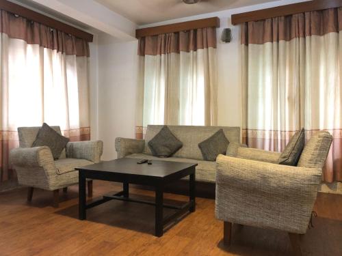 Coin salon dans l'établissement Apartment in Nepal