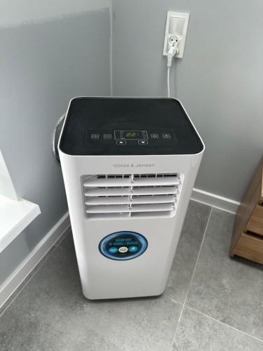 a toaster is sitting on the floor in a room at DUET s c MOTEL in Słubice