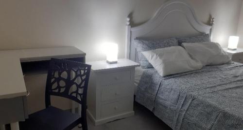 Katil atau katil-katil dalam bilik di Palazzo dei Sogni Rooms Suite