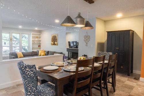 a kitchen and dining room with a table and chairs at Pet-Friendly Beach Getaway, Relax by the Bay! in Annapolis