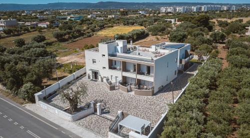 an aerial view of a white house at Eleia Domos in Monopoli