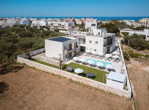 an aerial view of a villa with a swimming pool at Eleia Domos in Monopoli
