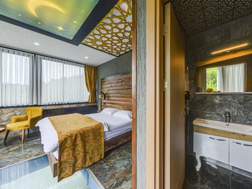 Postel nebo postele na pokoji v ubytování Mcora Tatil Köyü
