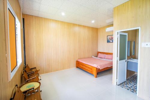 Cama o camas de una habitación en Nirvana Beach Villages