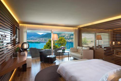 Postel nebo postele na pokoji v ubytování The View Lugano