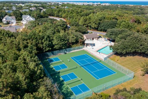 an aerial view of a tennis court with two tennis courts at The Tipsea Turtle in Corolla