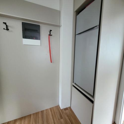 a room with a sliding door and a window at Apartment for 2 people in the city center in Hradec Králové