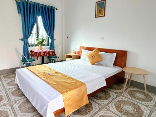 Postel nebo postele na pokoji v ubytování khách sạn đặng gia