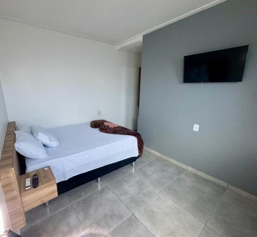 Una cama o camas en una habitación de Hotel Torre do Sal