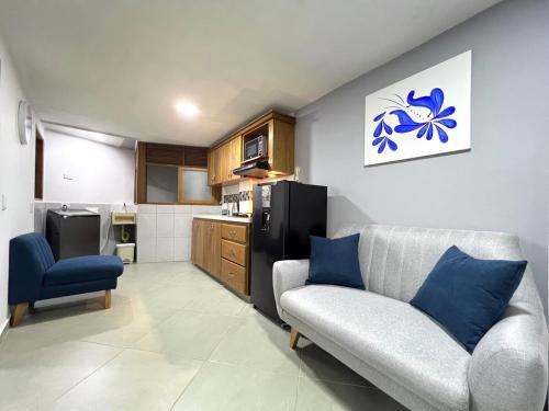 Kuchyň nebo kuchyňský kout v ubytování Apartamento Florelba-a solo dos cuadras del parque