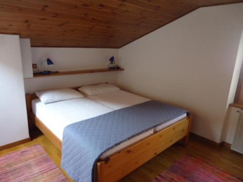 Posteľ alebo postele v izbe v ubytovaní Casa Martinelli - Trameri