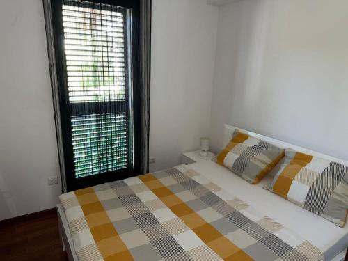 Postel nebo postele na pokoji v ubytování Villa Peric