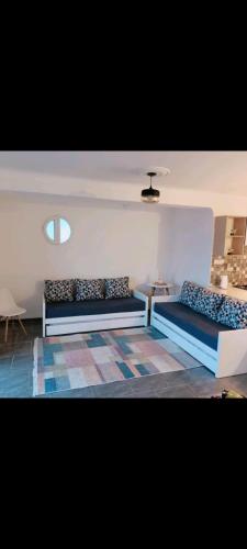 Posezení v ubytování L'appartement Bleu