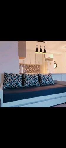Posezení v ubytování L'appartement Bleu