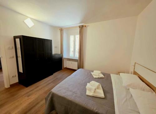 Postel nebo postele na pokoji v ubytování Ai Torrioni - Casa Casoni
