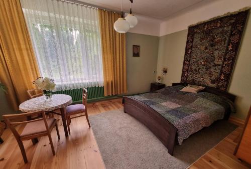 Postel nebo postele na pokoji v ubytování Dom 10km od granicy Budomierz