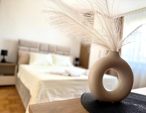 Postel nebo postele na pokoji v ubytování Maribelle Apartments