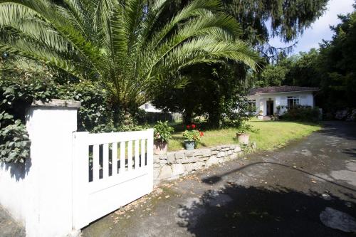 Maison dans un écrin de verdure