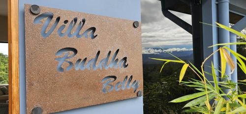 a sign that reads villa balili balili baby at Villa Buddha Belly OceanMountain top views in Quepos