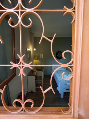 a view of a room through a mirror at Litsa Apartments in Lákka
