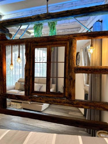 a mirror in the middle of a room at Terry Haus in Enego