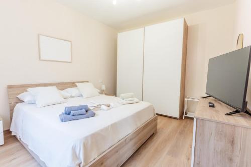 Ένα ή περισσότερα κρεβάτια σε δωμάτιο στο The small lemon garden