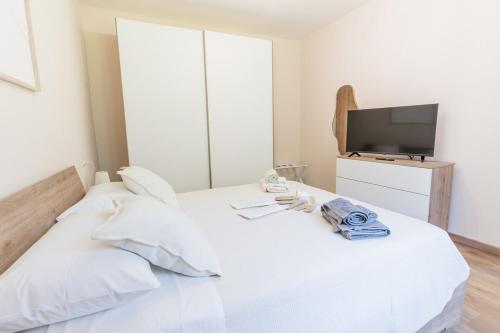 Ένα ή περισσότερα κρεβάτια σε δωμάτιο στο The small lemon garden