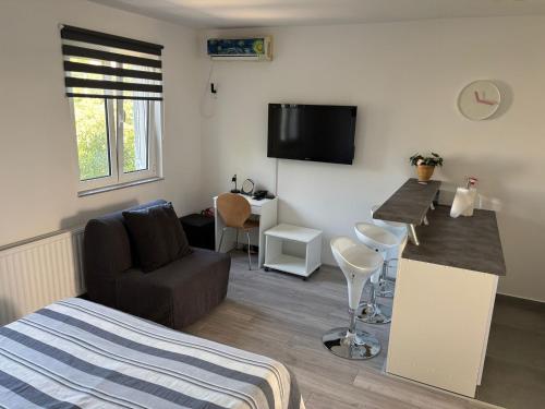 Μια τηλεόραση ή/και κέντρο ψυχαγωγίας στο Studio Apartman NoNa