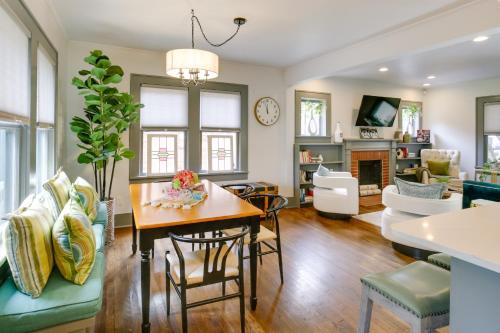 a living room with a table and chairs at Renovated Lubbock Home - Walk to Texas Tech! in Lubbock