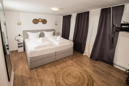Ένα ή περισσότερα κρεβάτια σε δωμάτιο στο THEFIVE60 Apartments